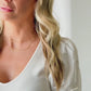 sideways cross necklace