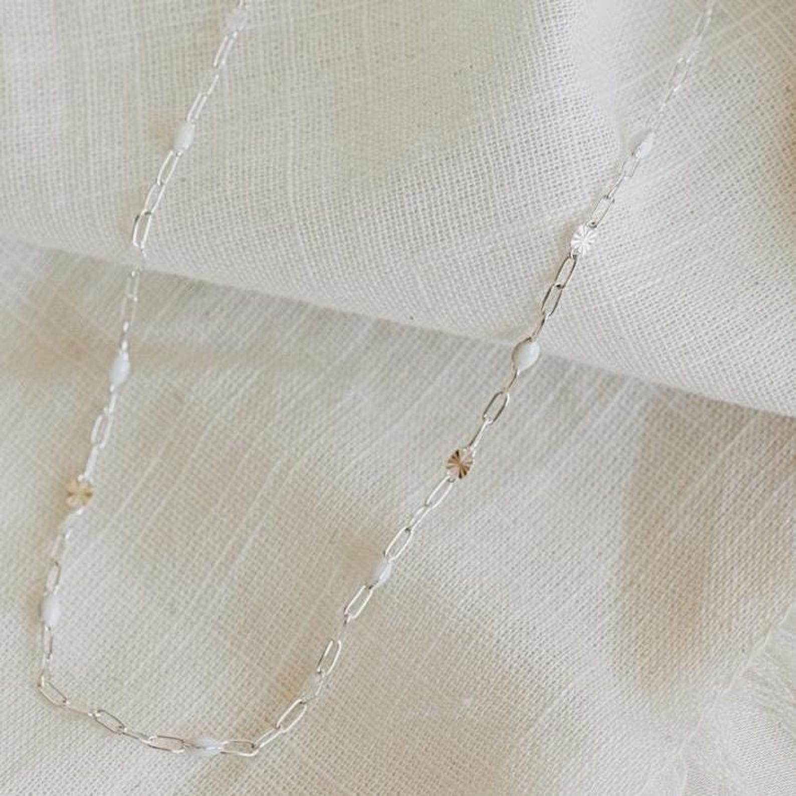 white enamel necklace