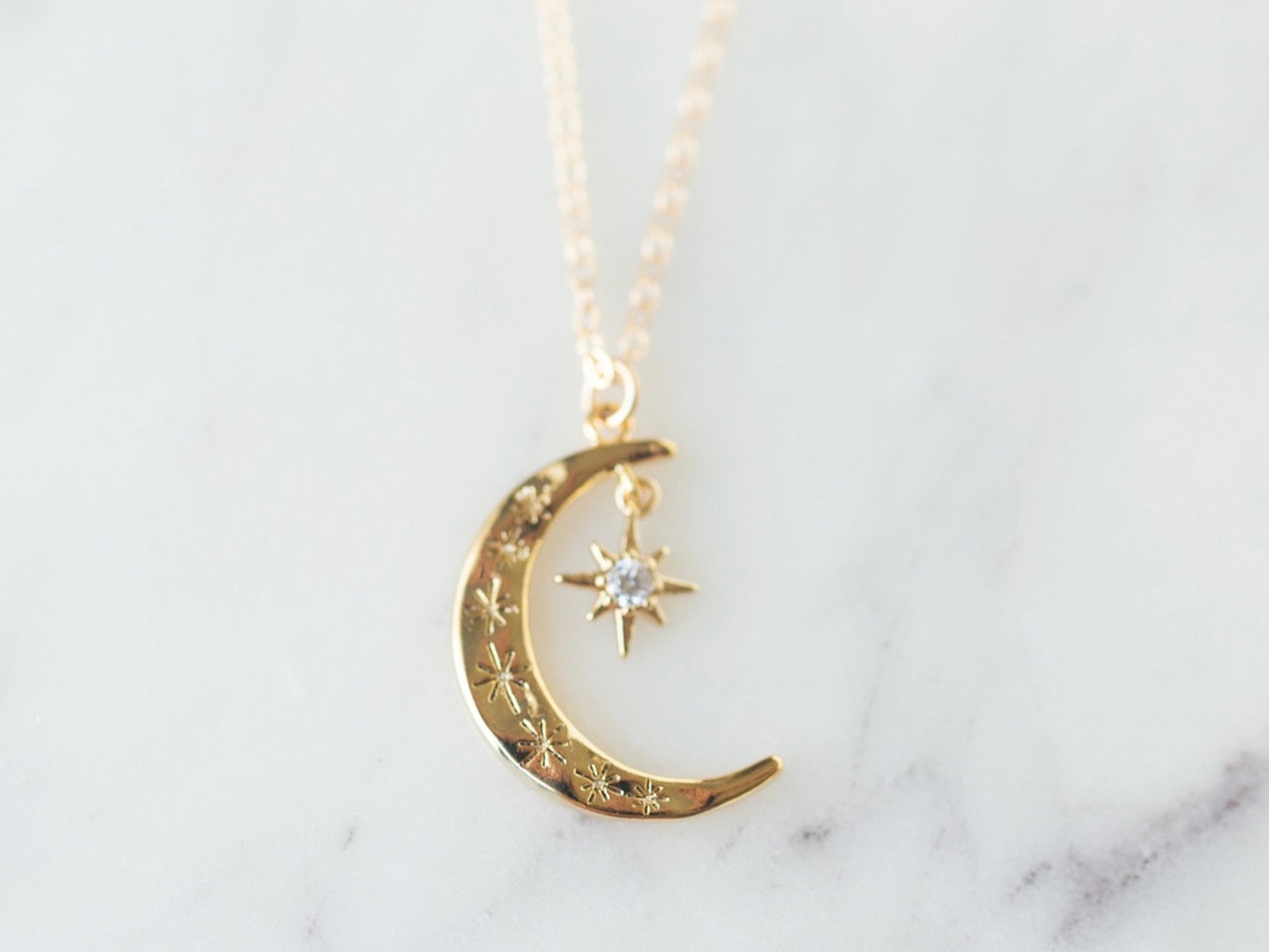 crescent gold necklace
