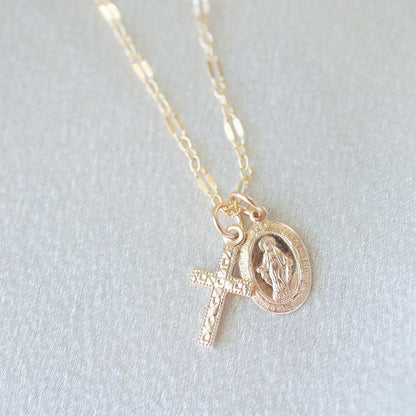 Gold filled chain necklace with Virgin Mary medallion and cross pendant.